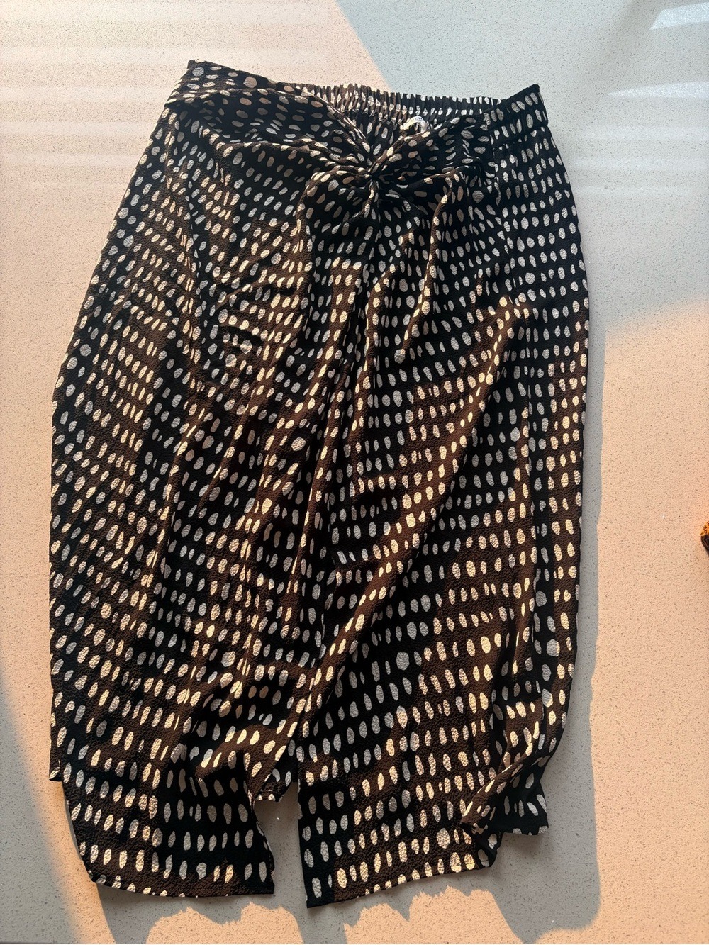 Pennington’s Black Printed Knot-Front Midi Skirt